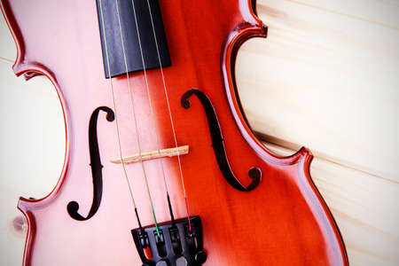 Violin on wooden backgroundの写真素材