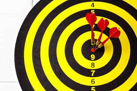 darts arrows in the target center for background