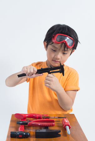 asian boy play engineerの写真素材