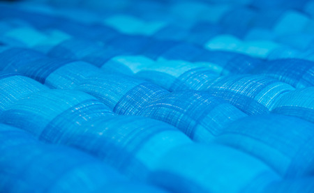 blue bedding soft fabric backgroundの写真素材