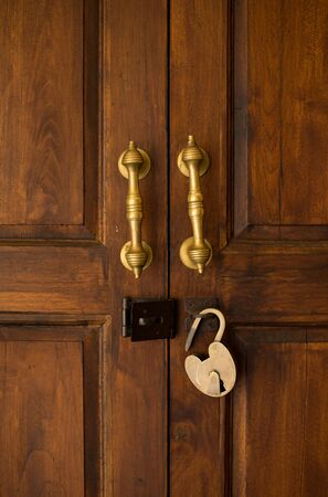 door handle locked wooden vintage retro metal brass unlockの写真素材