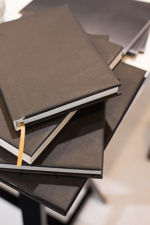 black book notebook white paper page business officeの写真素材