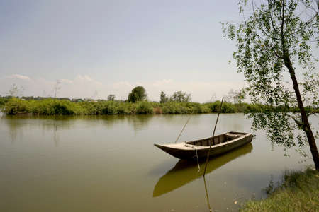 Boat at the river bank / nature backgroundの写真素材