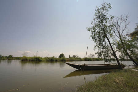 Boat at the river bank / nature backgroundの写真素材