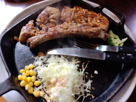 Steak served on the hot plate / Japanese Crusine  mealの写真素材