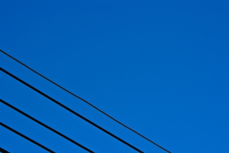 electric line corner in skyの写真素材