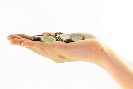 Coins on hand isolate on white background