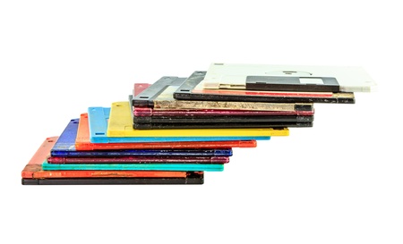 old magnetic disk for a computer isolate on white backgroundの写真素材