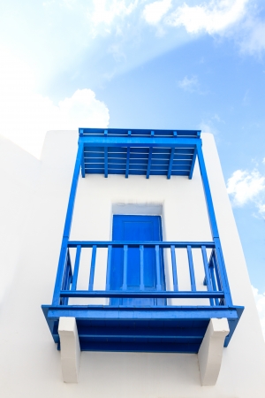 Blue colonial door on a wallの写真素材