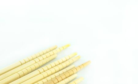 Many chopsticks isolate on white backgroundの写真素材