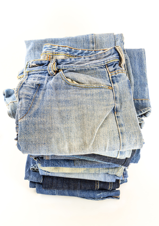 a lot of jeans on white の写真素材