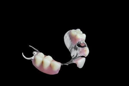 Partial Denture on black の写真素材