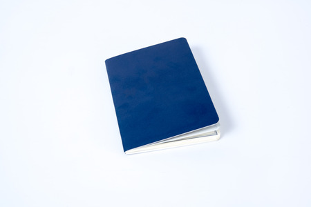 Blank blue passport on white backgroundの写真素材