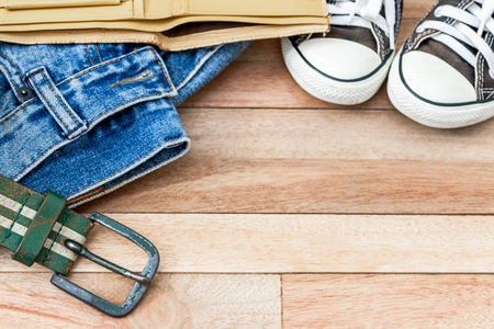 Grunge wooden background and vintage cloths and accessories onの写真素材
