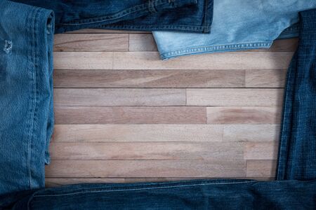 jeans on a grunge wooden backgroundの写真素材