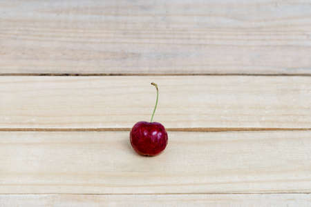Sweet fresh cherry on woodenの写真素材
