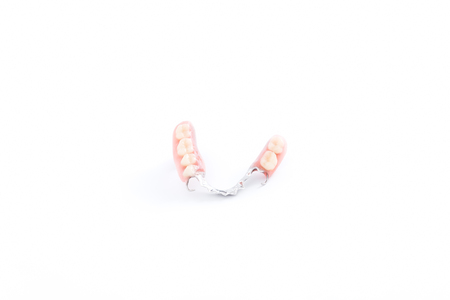 partial denture,dental prosthetics on a white backgroundの写真素材