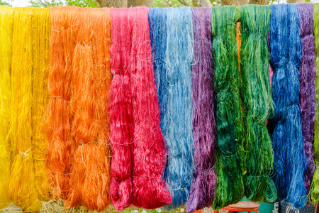 Silk Production Process, Silkworm cocoons.Colorful raw silk thread  in country of asiaの写真素材