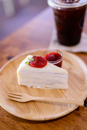 Crepes Strawberry Cake with coffeeの写真素材