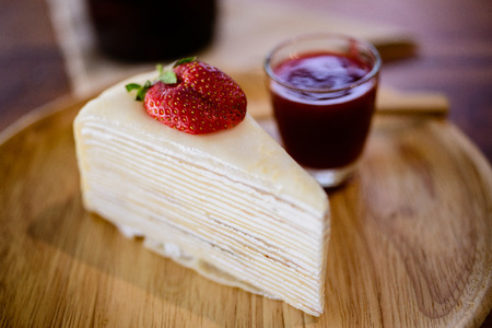 Crepes Strawberry Cake with coffeeの写真素材