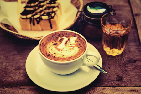 Coffee Mocha hot with delicious assorted accessories.の写真素材