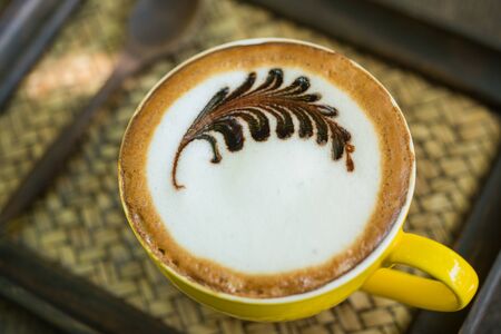 Mocha coffee with hot milk in coffee beautiful makeup.の写真素材