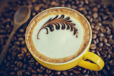 Mocha coffee with hot milk in coffee, beautiful makeup.の写真素材