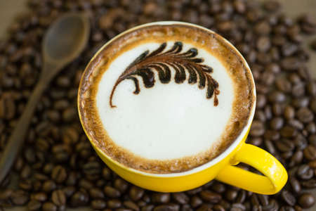 Mocha coffee with hot milk in coffee, beautiful makeup.の写真素材