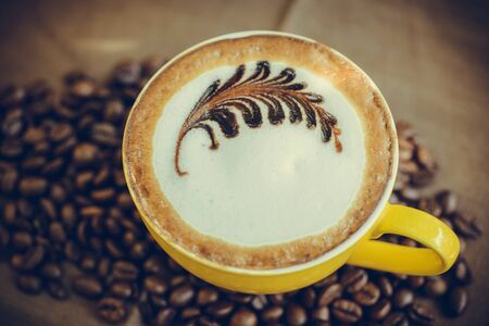 Mocha coffee with hot milk in coffee beautiful makeup.の写真素材