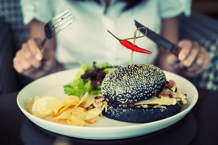 Young thick dough ham sandwich. Serve the salad with set point.の写真素材