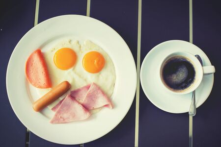 Ham breakfast served with coffee