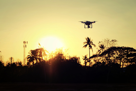 Drone flying in the sunset light beautiful and drone white color