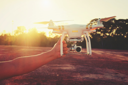 Drone flying in the sunset light beautiful and drone white color