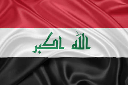 Flag of Iraq waving with highly detailed textile texture patternの写真素材