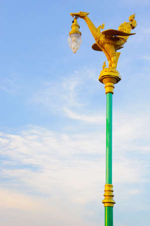 Thai Style Bird Lamp on a poleの写真素材