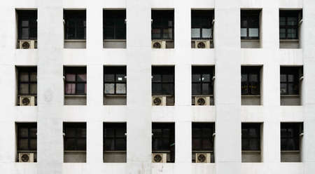 Apartment windows and air conditioningの写真素材