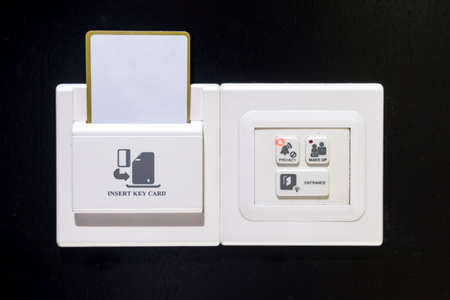 Keycard socket, entrance light switch, make up room switch, privacy switch in hotel