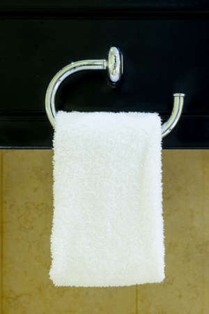 Hanging Towel in a bathroomの写真素材