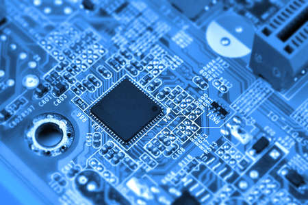 Closeup of electronic circuit board with chip. Macro with extremely shallow dof.