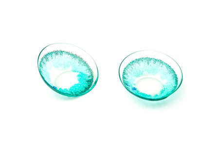Colored contact lenses isolated on a white background.の写真素材