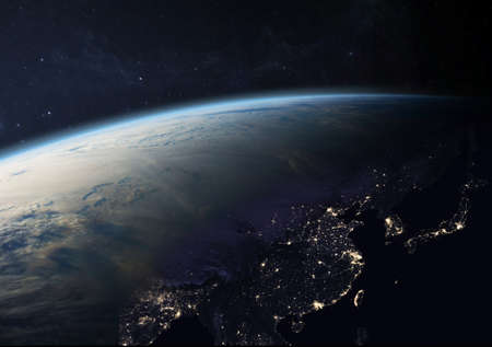 Planet Earth from the space at night. Asia at night viewed from space with city lights in China,...