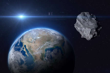 Planet Earth and big asteroid in the space. Concept a potentially hazardous object (PHO)....