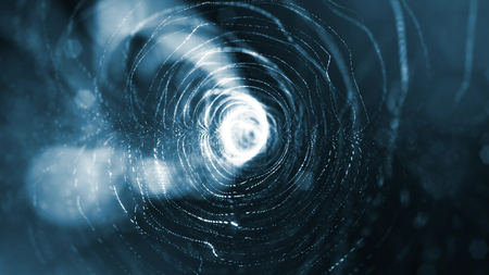 science fiction background of glowing particles with depth of field and bokeh. Particles form line...
