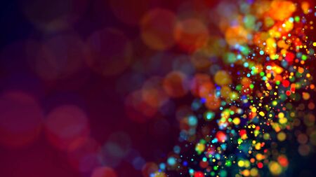 a cloud of multicolored particles in the air like sparkles on a dark background with a small depth of field. beautiful bokeh light effects with colored particles. background for holiday presentationsの写真素材