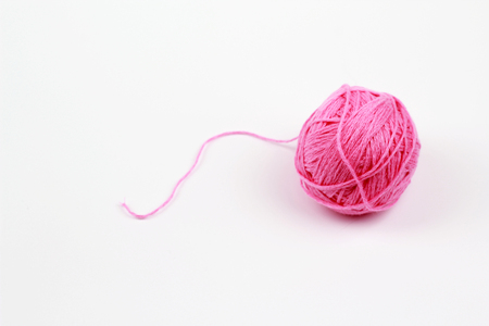 Pink wool yarn ballsの写真素材