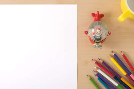 Multiple colour pencils on the  wood texture table with many compositionの写真素材