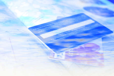 abstract scene of geographical atlas and credit cardsの写真素材