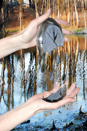 abstracts scene of the hand of the person and current timeの写真素材