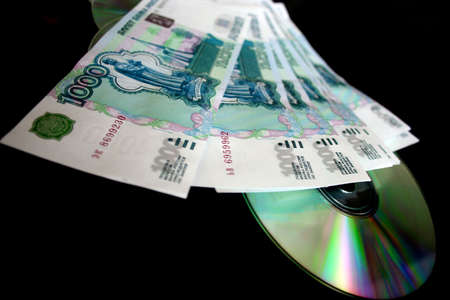 soft money and compact disk for computerの写真素材