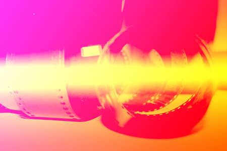  abstract photographic negative film rolling up in spirals forms patternsの写真素材